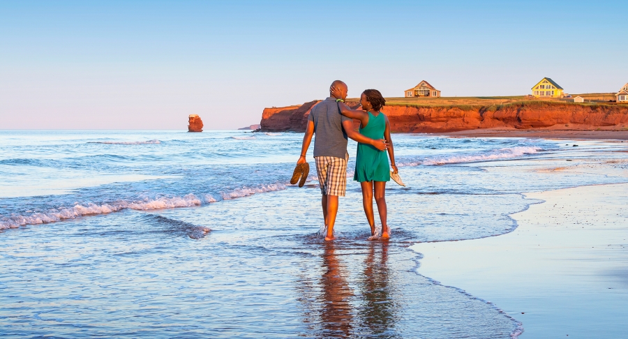 Sea View Beach, couple walking, back view, waves